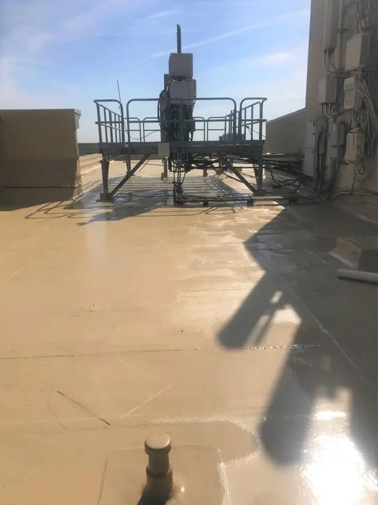 Commercial flat roof restoration with polyurea coating — project 2