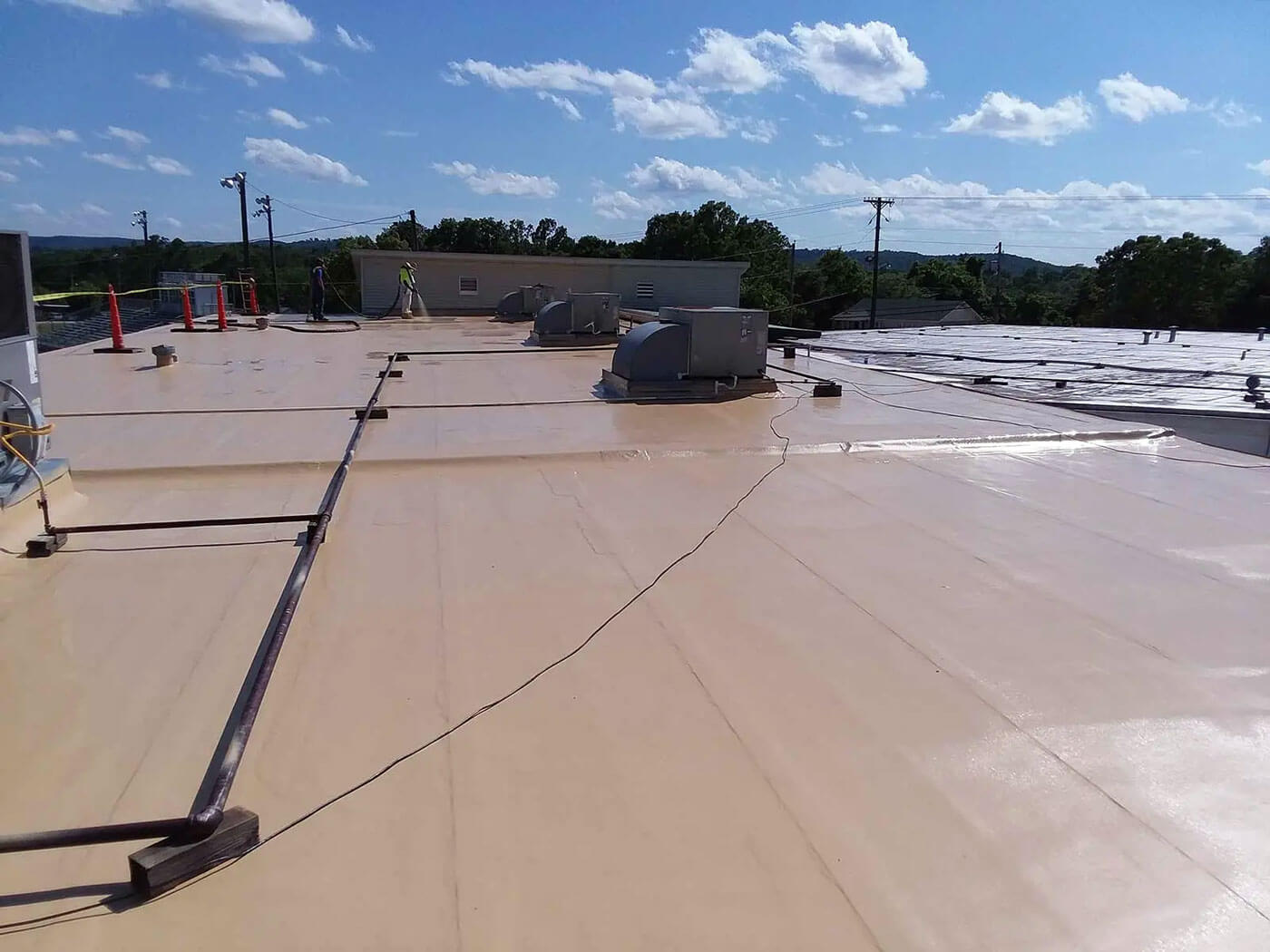 Commercial flat roof restoration with polyurea coating — project 6
