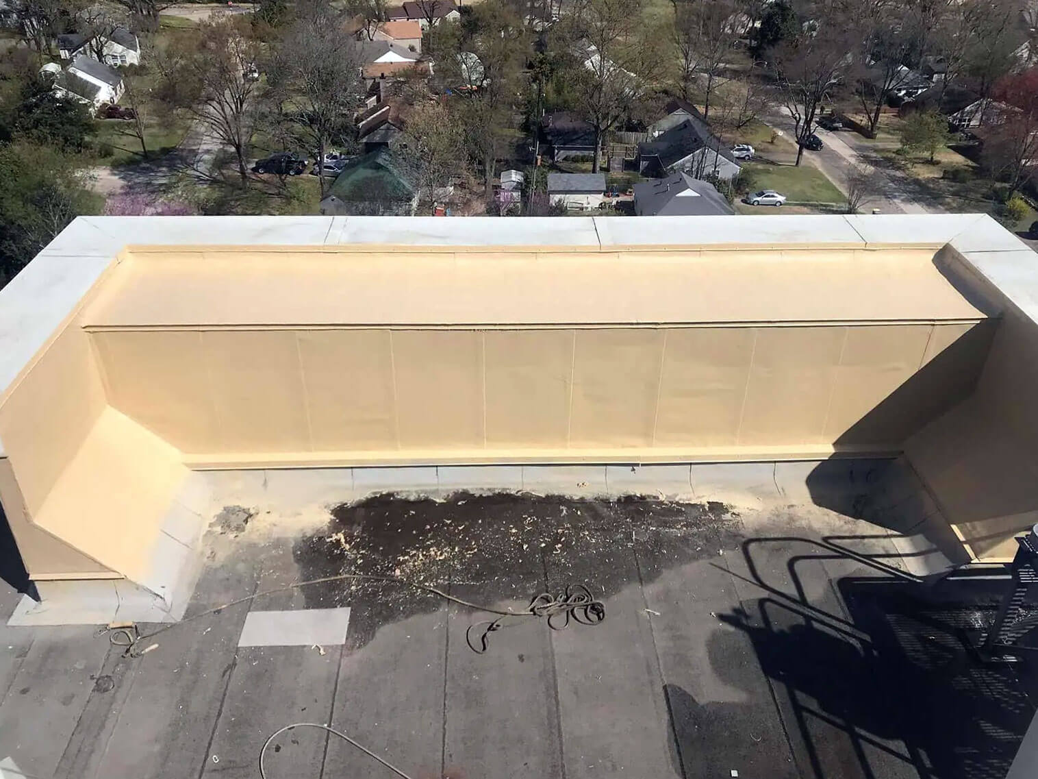 Commercial flat roof restoration with polyurea coating — project 7