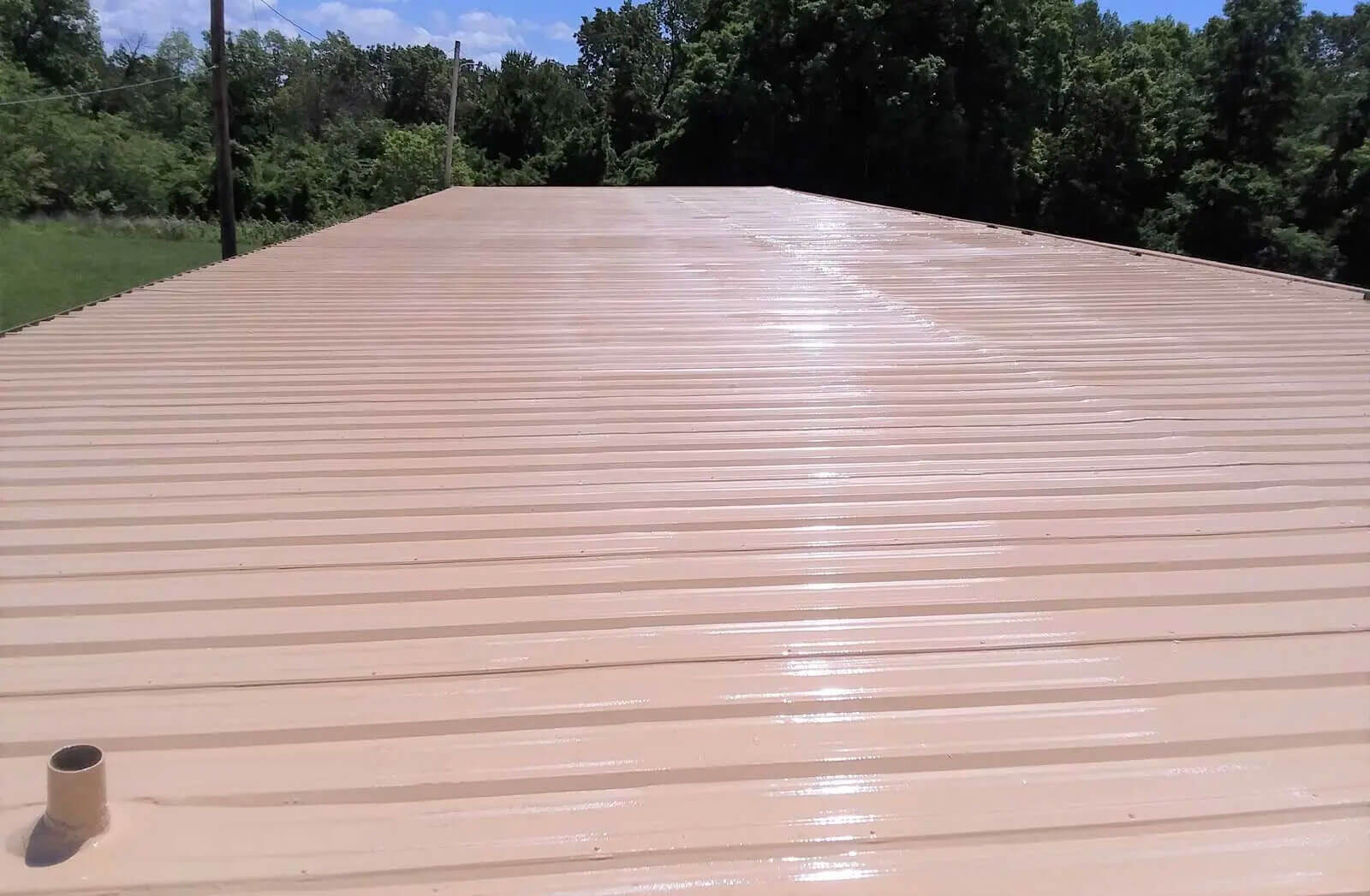 Commercial flat roof restoration with polyurea coating — project 9